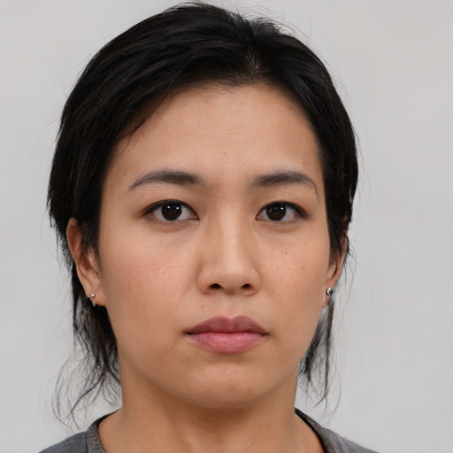 Neutral asian young-adult female with medium  black hair and brown eyes