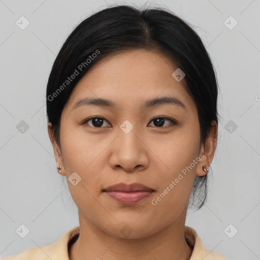 Joyful asian young-adult female with medium  brown hair and brown eyes