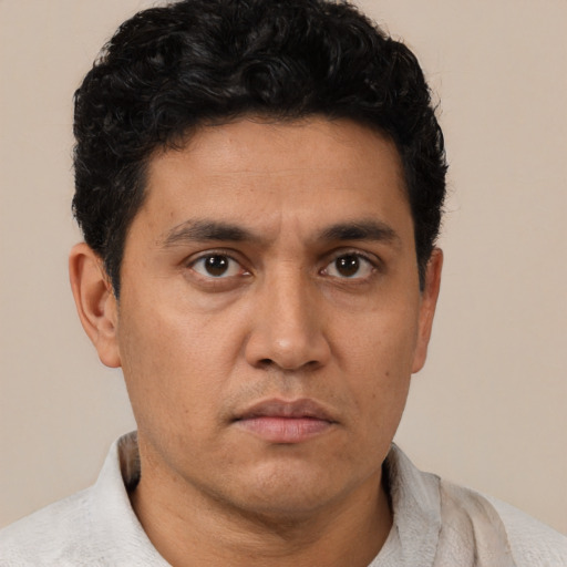 Neutral asian young-adult male with short  brown hair and brown eyes
