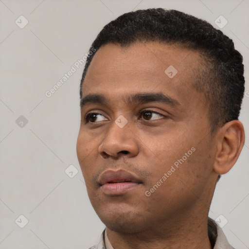 Neutral black young-adult male with short  black hair and brown eyes
