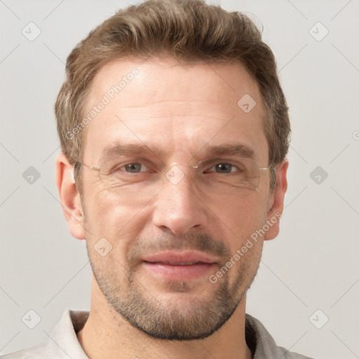 Joyful white adult male with short  brown hair and grey eyes