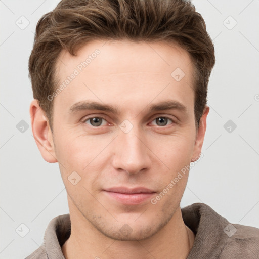 Neutral white young-adult male with short  brown hair and grey eyes