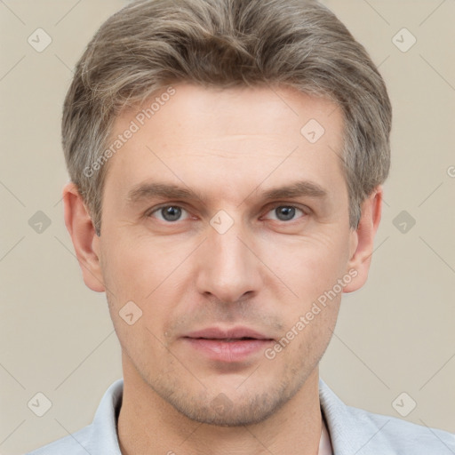 Neutral white adult male with short  brown hair and grey eyes