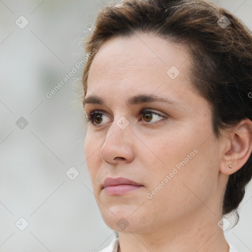 Neutral white young-adult female with medium  brown hair and brown eyes