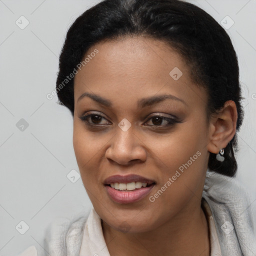 Joyful black young-adult female with medium  brown hair and brown eyes