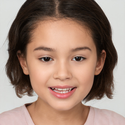 Joyful white child female with medium  brown hair and brown eyes