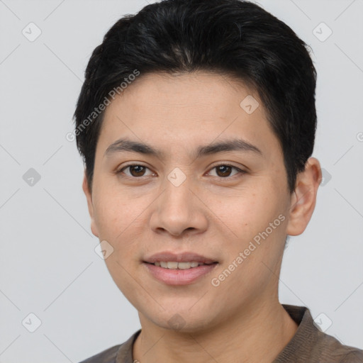 Joyful white young-adult male with short  black hair and brown eyes