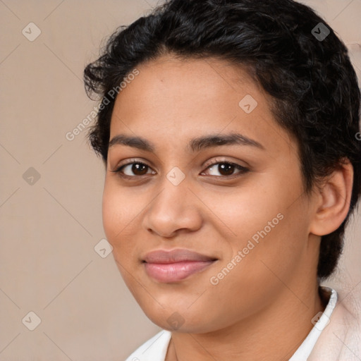 Joyful latino young-adult female with short  brown hair and brown eyes