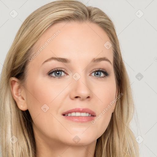 Joyful white young-adult female with long  brown hair and blue eyes