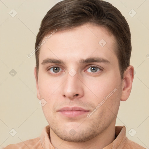 Neutral white young-adult male with short  brown hair and grey eyes