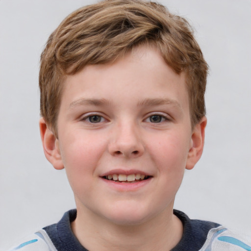 Joyful white child male with short  brown hair and grey eyes