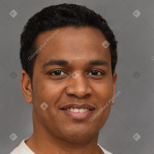 Joyful latino young-adult male with short  brown hair and brown eyes