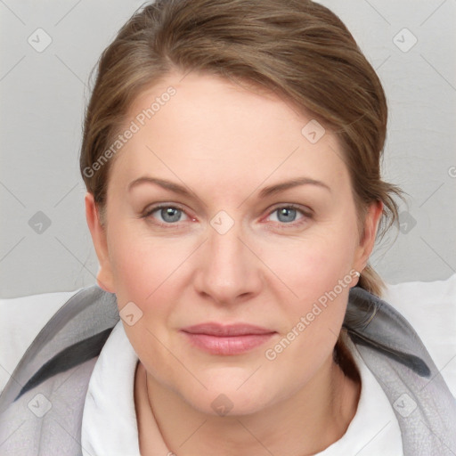 Joyful white young-adult female with medium  brown hair and blue eyes