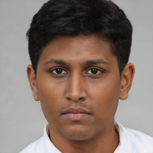Neutral black young-adult male with short  brown hair and brown eyes