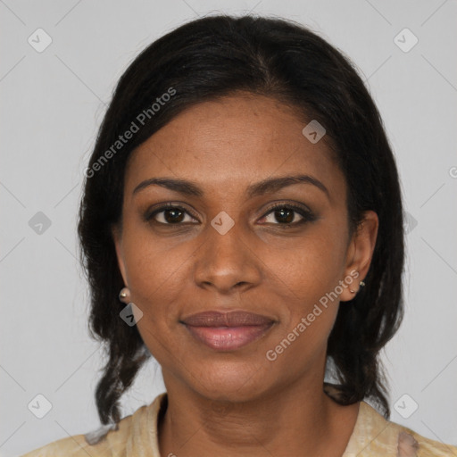 Joyful black young-adult female with medium  brown hair and brown eyes