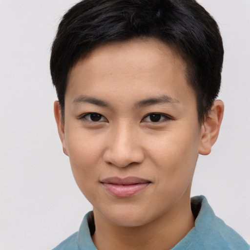 Joyful asian young-adult female with short  brown hair and brown eyes
