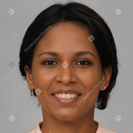 Joyful latino young-adult female with short  brown hair and brown eyes