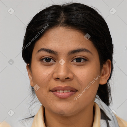 Joyful latino young-adult female with long  brown hair and brown eyes