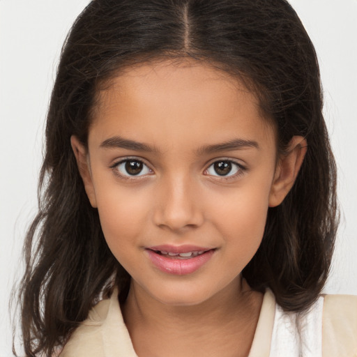 Joyful white child female with medium  brown hair and brown eyes