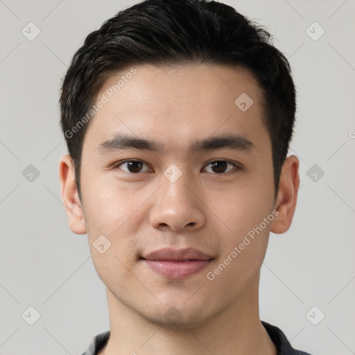 Joyful white young-adult male with short  black hair and brown eyes