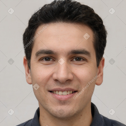 Joyful white young-adult male with short  black hair and brown eyes