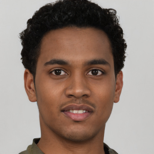 Neutral black young-adult male with short  black hair and brown eyes