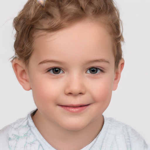 Joyful white child female with short  brown hair and brown eyes