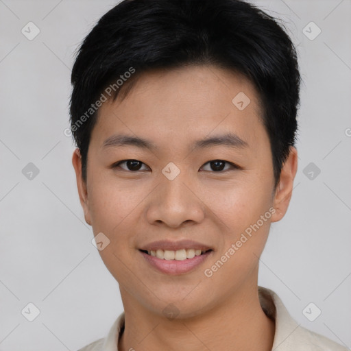 Joyful asian young-adult male with short  black hair and brown eyes