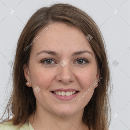 Joyful white young-adult female with long  brown hair and grey eyes