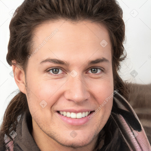 Joyful white young-adult female with long  brown hair and grey eyes