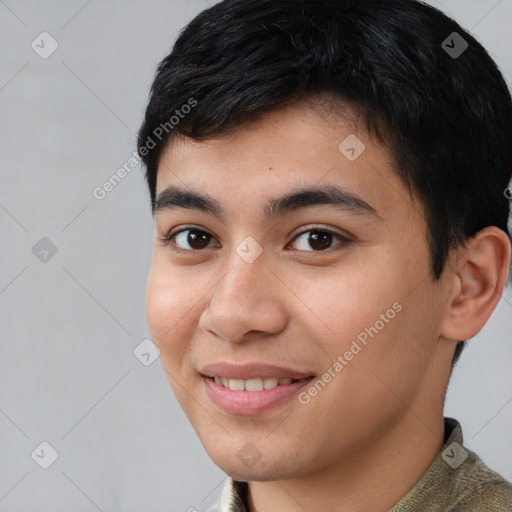 Joyful white young-adult male with short  black hair and brown eyes