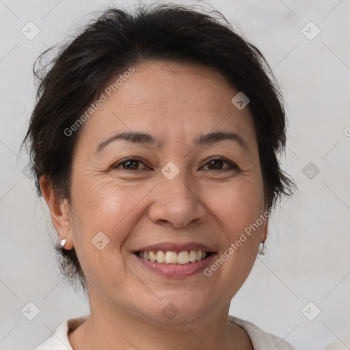 Joyful white adult female with short  brown hair and brown eyes