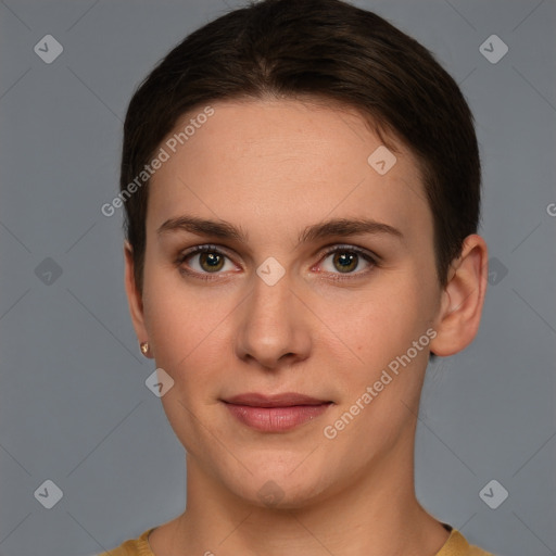 Joyful white young-adult female with short  brown hair and brown eyes