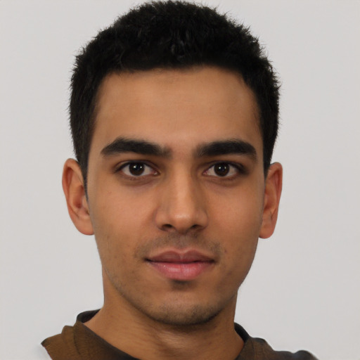 Neutral latino young-adult male with short  black hair and brown eyes