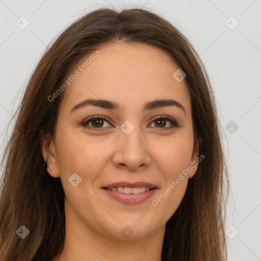 Joyful white young-adult female with long  brown hair and brown eyes