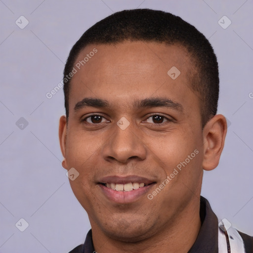 Joyful latino young-adult male with short  brown hair and brown eyes