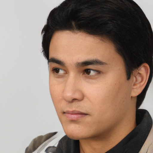 Neutral white young-adult male with short  black hair and brown eyes
