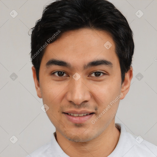 Joyful latino young-adult male with short  black hair and brown eyes