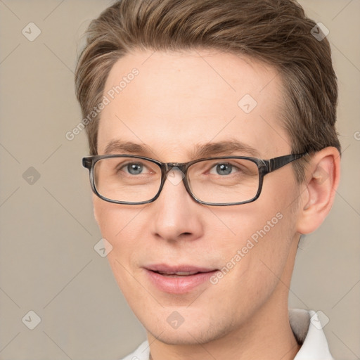 Joyful white adult male with short  brown hair and grey eyes