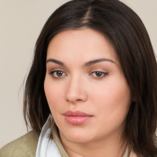 Neutral white young-adult female with medium  brown hair and brown eyes