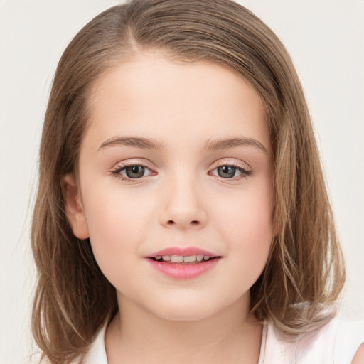 Joyful white child female with medium  brown hair and brown eyes