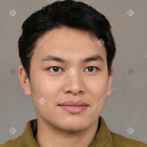 Joyful asian young-adult male with short  brown hair and brown eyes