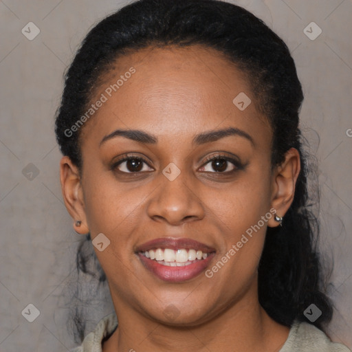 Joyful black young-adult female with long  black hair and brown eyes