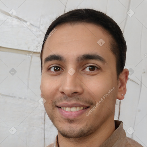 Joyful white young-adult male with short  black hair and brown eyes