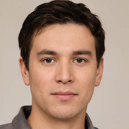Neutral white young-adult male with short  brown hair and brown eyes