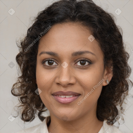 Joyful black young-adult female with medium  brown hair and brown eyes