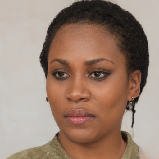 Neutral black young-adult female with short  black hair and brown eyes