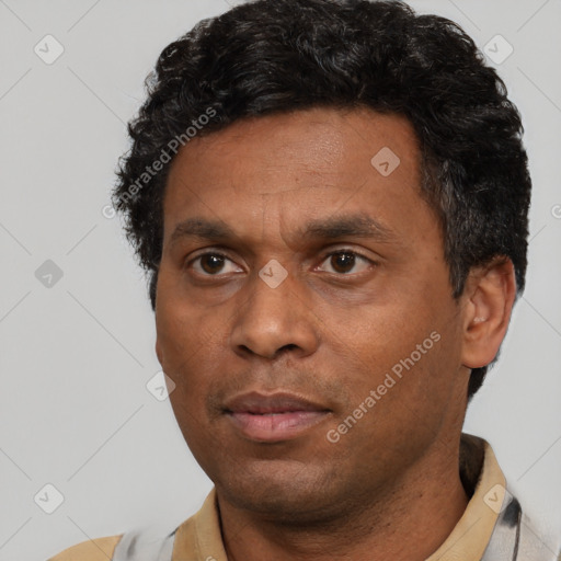 Neutral latino adult male with short  black hair and brown eyes
