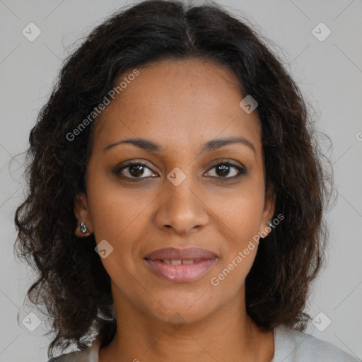 Joyful black young-adult female with medium  brown hair and brown eyes