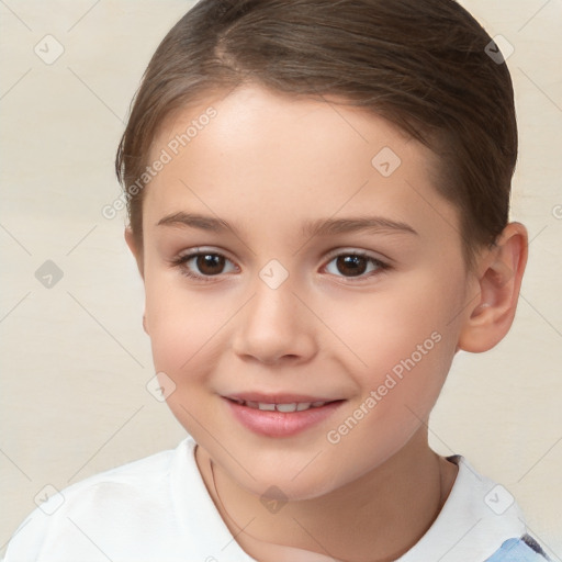 Joyful white child female with short  brown hair and brown eyes